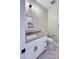 Well-lit bathroom featuring a single sink vanity, quartz countertop, and modern fixtures at 25745 W Peak View Rd, Wittmann, AZ 85361