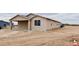 Exterior view of single-story home with covered patio at 25745 W Peak View Rd, Wittmann, AZ 85361