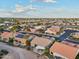 Scenic aerial view showcasing a residential area with landscaped yards and inviting outdoor spaces at 2722 N 155Th Dr, Goodyear, AZ 85395