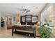 Stylish living room with comfortable seating, elegant decor, and a view into dining room at 2722 N 155Th Dr, Goodyear, AZ 85395