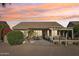 Charming covered patio area perfect for entertaining or relaxing outdoors during the sunset at 2722 N 155Th Dr, Goodyear, AZ 85395