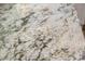 Close-up shot of the granite countertop featuring different colors and patterns at 313 E Westchester Dr, Tempe, AZ 85283