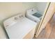 A laundry area featuring a Whirlpool dryer and LG washing machine at 313 E Westchester Dr, Tempe, AZ 85283