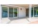 Covered patio features sliding glass doors, creating an indoor/outdoor living space at 313 E Westchester Dr, Tempe, AZ 85283