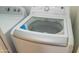 A clean and modern top-loading washing machine for efficient laundry at 313 E Westchester Dr, Tempe, AZ 85283