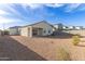 Picture of the backyard with low maintenance desert landscaping and views of the neighborhood at 3165 N 306Th Ln, Buckeye, AZ 85396