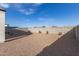 Picture of a private backyard featuring desert landscaping and a block wall providing privacy at 3165 N 306Th Ln, Buckeye, AZ 85396