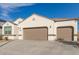 Beautiful single-story home showcasing a well-maintained garage and complemented by desert landscaping at 3165 N 306Th Ln, Buckeye, AZ 85396