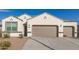 Inviting single-Gathering house with a two-car garage and low maintenance desert landscaping in a sunny setting at 3165 N 306Th Ln, Buckeye, AZ 85396