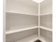 Walk-in pantry with ample shelving providing plenty of storage space at 3165 N 306Th Ln, Buckeye, AZ 85396