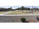 Scenic walking path amidst lush greenery and open spaces, ideal for leisurely strolls at 3165 N 306Th Ln, Buckeye, AZ 85396
