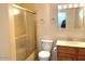 Bathroom featuring a shower, cabinet with sink, and a vanity mirror at 3242 W Christy Dr, Phoenix, AZ 85029