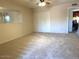 Bedroom with neutral carpeting and large closet space for ample storage at 3242 W Christy Dr, Phoenix, AZ 85029