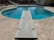 View of the backyard pool from the diving board at 3242 W Christy Dr, Phoenix, AZ 85029