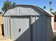Metal storage shed in the backyard with rock landscaping at 3242 W Christy Dr, Phoenix, AZ 85029