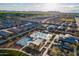 Aerial view of the community featuring a pool, basketball court and picnic area with mountain views at 4140 E Caitlin Dr, San Tan Valley, AZ 85140