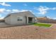 Low maintenance backyard featuring a convenient covered patio area and rock landscaping at 4140 E Caitlin Dr, San Tan Valley, AZ 85140