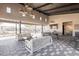 Bright community clubhouse featuring stylish lighting, modern furniture, and access to a pool at 4140 E Caitlin Dr, San Tan Valley, AZ 85140
