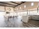 Spacious community room with a large dining table, kitchen area, and comfortable seating at 4140 E Caitlin Dr, San Tan Valley, AZ 85140