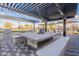 Community grill area under a pergola with a large table and chairs for gatherings at 4140 E Caitlin Dr, San Tan Valley, AZ 85140