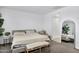 Bright main bedroom features a neutral palette, carpet, and ensuite bathroom access at 4140 E Caitlin Dr, San Tan Valley, AZ 85140