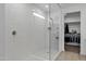 Large walk in shower features white tile, glass door, and walk in closet at 4140 E Caitlin Dr, San Tan Valley, AZ 85140