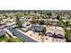 Aerial view of a charming neighborhood and landscape with mountain views in the background at 4305 E Cherokee St, Phoenix, AZ 85044