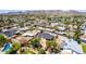 Aerial view of a home with desert landscape and a mountain view in the distance at 4305 E Cherokee St, Phoenix, AZ 85044