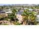Aerial view of a home's backyard with desert landscape and a mountain view in the distance at 4305 E Cherokee St, Phoenix, AZ 85044