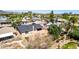 Aerial view of a home's backyard with a brick patio and an area to add your own desert landscape at 4305 E Cherokee St, Phoenix, AZ 85044
