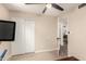 Bedroom featuring a ceiling fan, closet, and neutral colors at 4305 E Cherokee St, Phoenix, AZ 85044