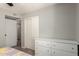 Bedroom featuring a closet, neutral walls, and a white dresser at 4305 E Cherokee St, Phoenix, AZ 85044