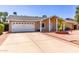 Single-story home with attached garage and desert landscaping in a quiet neighborhood at 4305 E Cherokee St, Phoenix, AZ 85044