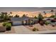 Charming single-story home boasting a well-maintained front yard with desert landscaping and a spacious driveway at 4305 E Cherokee St, Phoenix, AZ 85044