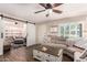 Comfortable living room with stylish sliding barn doors leading to additional living space at 4305 E Cherokee St, Phoenix, AZ 85044