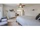 Bright bedroom featuring a closet, white dresser, and neutral colors at 4423 W Escuda Dr, Glendale, AZ 85308