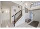 Welcoming entryway featuring a staircase, high ceilings and bright natural light at 4423 W Escuda Dr, Glendale, AZ 85308