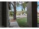 Inviting front porch view with mature tree and mountain backdrop, offering a serene welcome at 4423 W Escuda Dr, Glendale, AZ 85308
