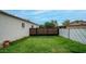 Back yard with a section of green grass and new brown fencing at 4630 N 12Th Pl, Phoenix, AZ 85014