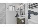 Modern bathroom with sleek vanity, stylish mirror, and contemporary hexagon-shaped tile at 4630 N 12Th Pl, Phoenix, AZ 85014