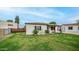 This property features a well-maintained lawn, decorative landscaping and a clean, modern design at 4630 N 12Th Pl, Phoenix, AZ 85014