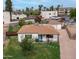 Charming single-story home with a well-manicured lawn and a detached garage at 4630 N 12Th Pl, Phoenix, AZ 85014