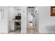 Bright hallway featuring an integrated desk space and access to other rooms at 4630 N 12Th Pl, Phoenix, AZ 85014