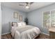 Light and airy bedroom with neutral color scheme, natural lighting and wood floors at 4810 W Kelton Ln, Glendale, AZ 85306