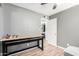 Bedroom featuring gray walls, a ceiling fan, and a Husky brand workbench at 4810 W Kelton Ln, Glendale, AZ 85306