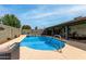 Refreshing pool with a spacious patio and covered outdoor area, ideal for relaxation and entertaining guests at 4810 W Kelton Ln, Glendale, AZ 85306