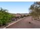 Wide angle view of a beautifully landscaped backyard at 6339 S Palo Blanco Dr, Gold Canyon, AZ 85118