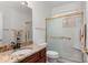Bathroom features granite countertops, a large mirror, and a shower with sliding glass doors at 6339 S Palo Blanco Dr, Gold Canyon, AZ 85118
