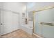 White bathroom with soaking tub and glass-enclosed shower at 6339 S Palo Blanco Dr, Gold Canyon, AZ 85118