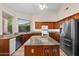 Open kitchen with stainless steel appliances, a center island, and lots of counter space at 6339 S Palo Blanco Dr, Gold Canyon, AZ 85118